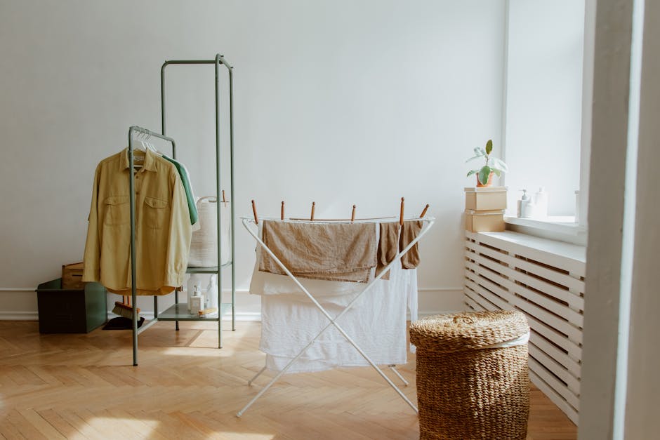 modern laundry room interior with built-in storage and drying rack