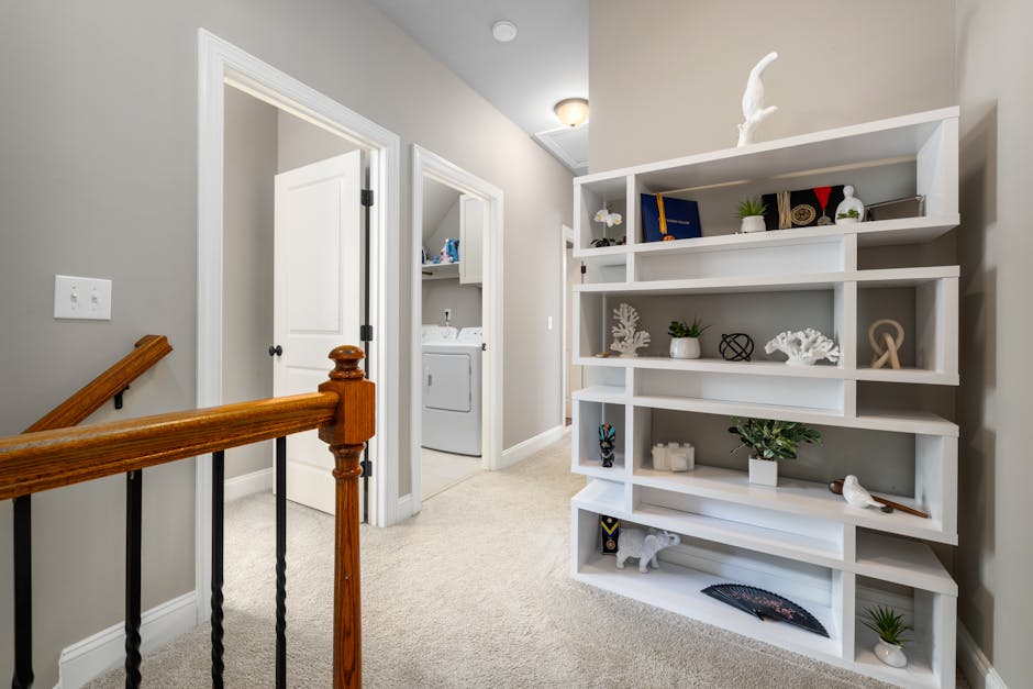 minimalist laundry room with natural wood shelves and soft light