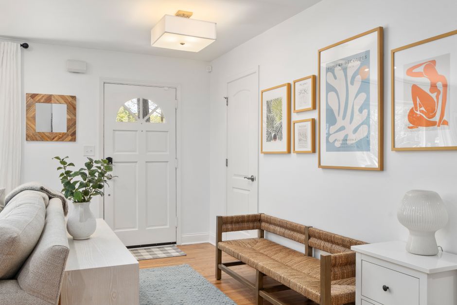 modern minimalist entryway with wood accents and natural light