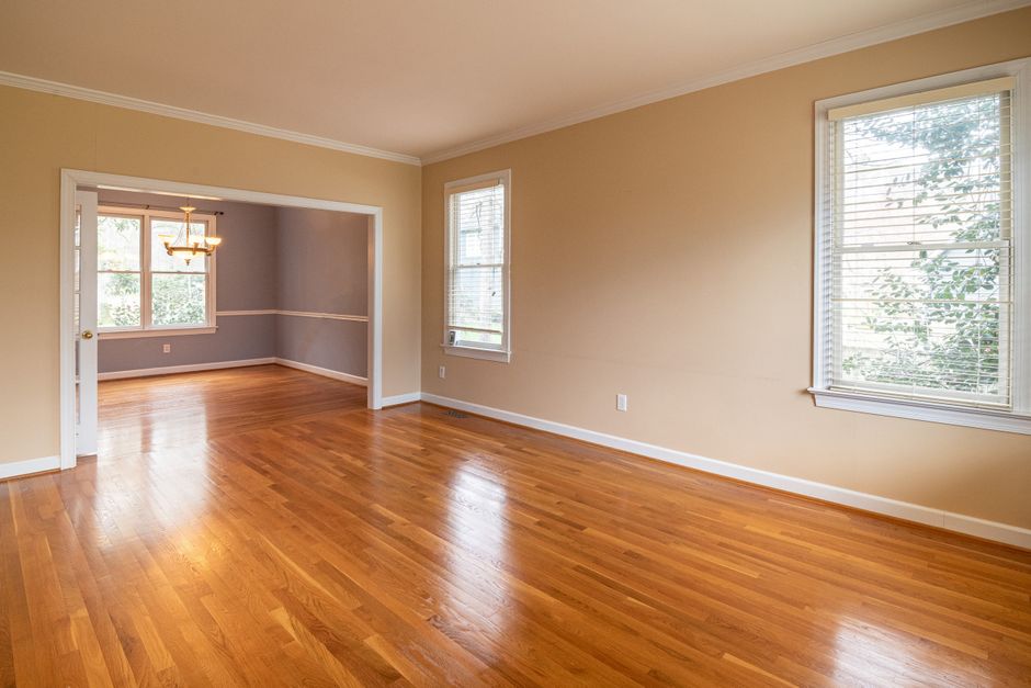 interior design bright living room with large windows and wood floor
