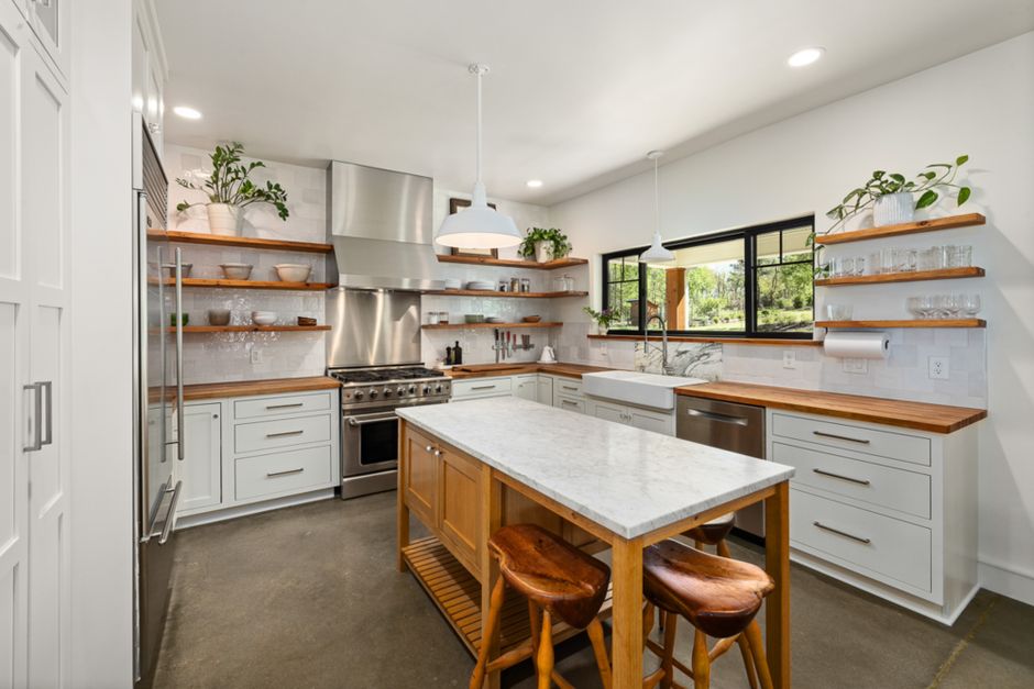 modern kitchen design with open shelving and natural light