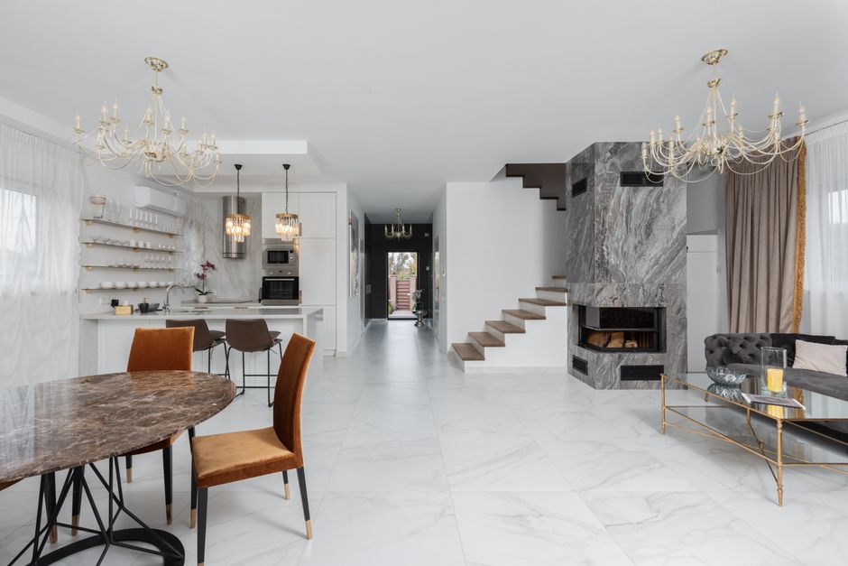 modern open concept living room with staircase