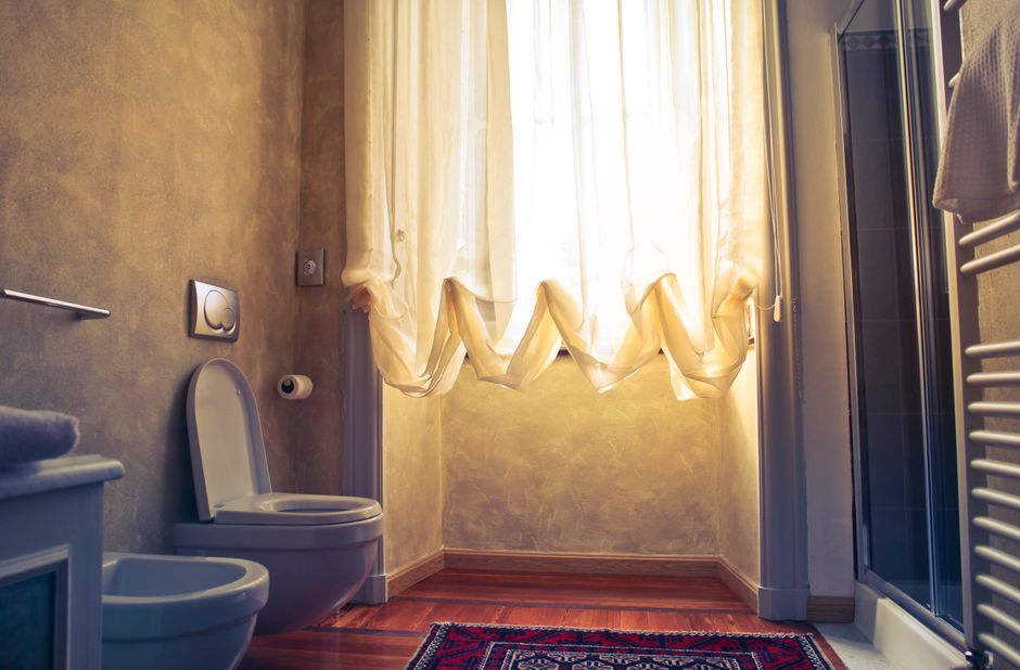 cozy bathroom interior design with wooden floor and soft lighting