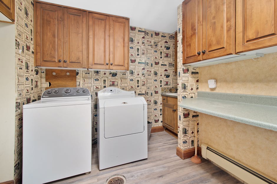 cozy laundry room with storage