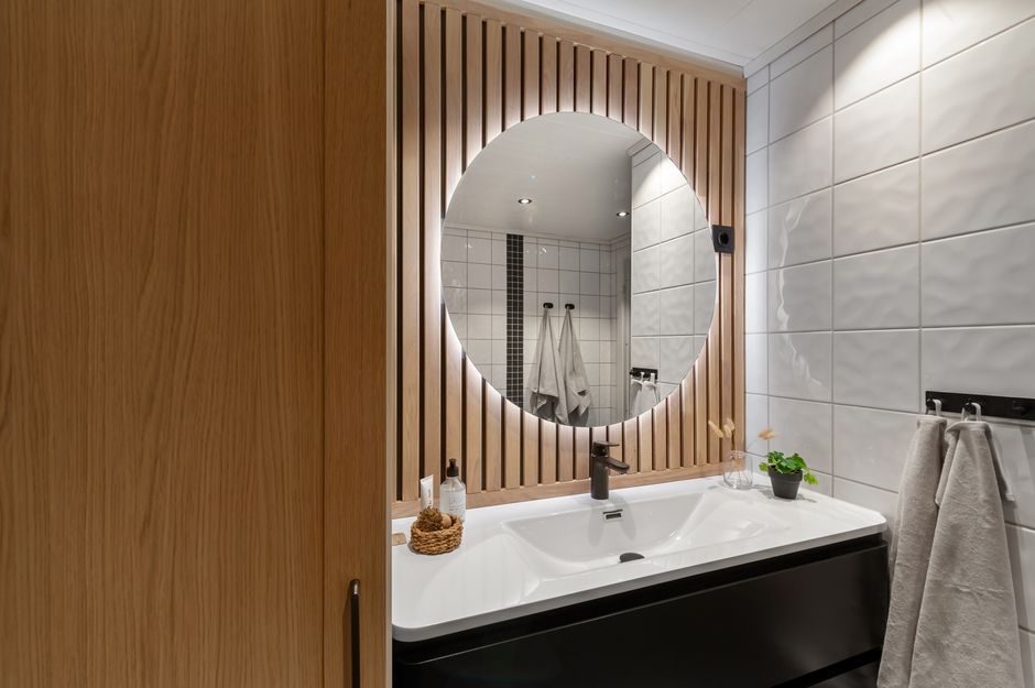 minimal wooden bathroom vanity with soft natural light