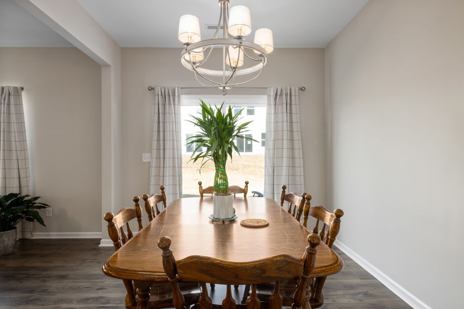 minimalist cozy dining room with wooden furniture