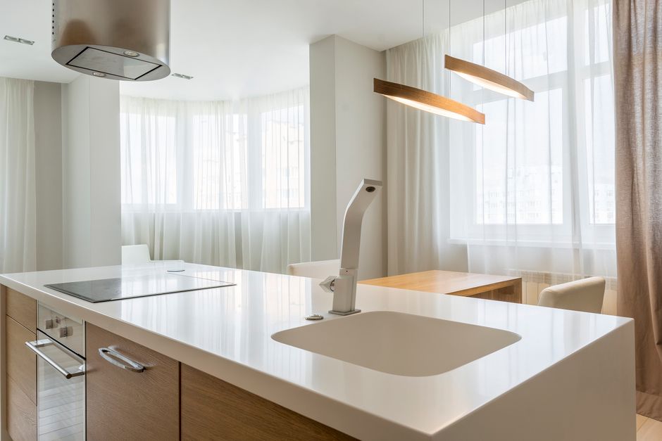 minimalist wooden kitchen interior detail with soft lighting
