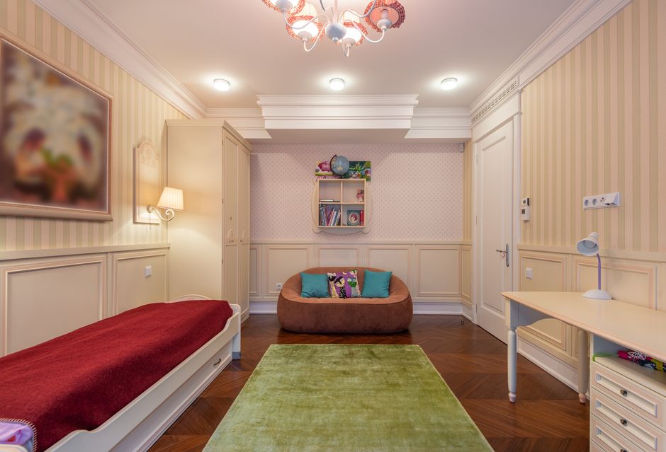 cozy children's room with natural light and wooden furniture
