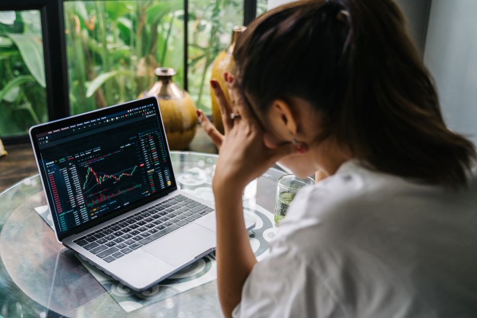 financial graph rising with worried expression home finance